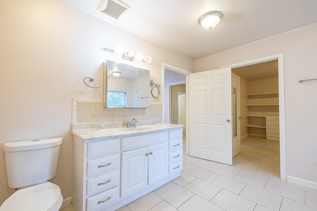 5003 Lord Rd, Crosby, TX 77532 - full bathroom with tile patterned floors, visible vents, toilet, vanity, and baseboards