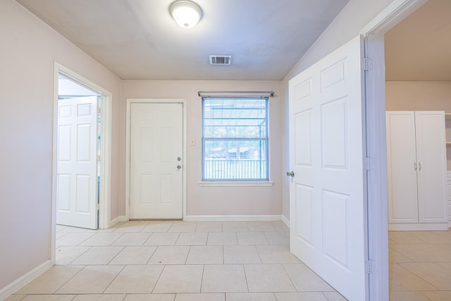 5003 Lord Rd, Crosby, TX 77532 - entryway featuring baseboards, visible vents, and light tile patterned floors