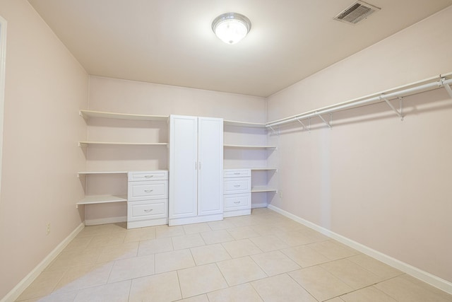 5003 Lord Rd, Crosby, TX 77532 - spacious closet with visible vents and light tile patterned floors