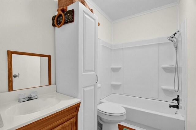 full bath with toilet, vanity, ornamental molding, and  shower combination