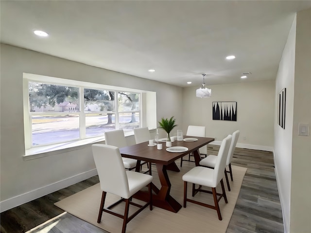5814 W Bellfort Ave, Houston, TX 77035 - dining room featuring baseboards, a notable chandelier, wood finished floors, and recessed lighting