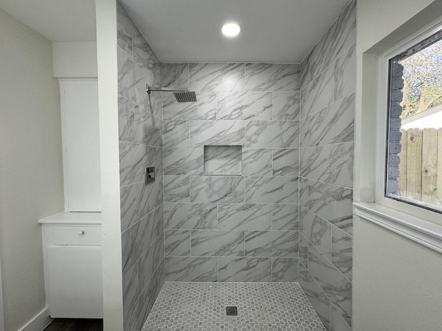 5814 W Bellfort Ave, Houston, TX 77035 - bathroom featuring recessed lighting and a tile shower