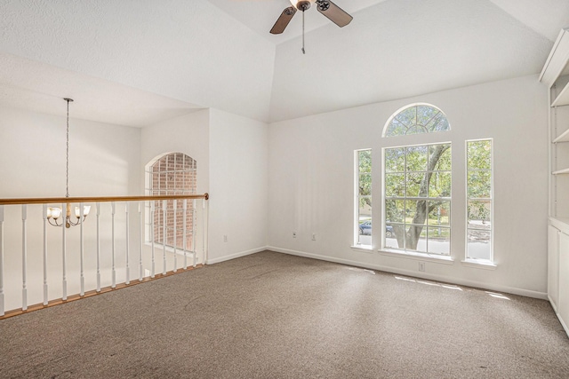 15242 Shapiro Springs Ln, Houston, TX 77095 - carpeted empty room featuring a chandelier, a ceiling fan, high vaulted ceiling, and baseboards