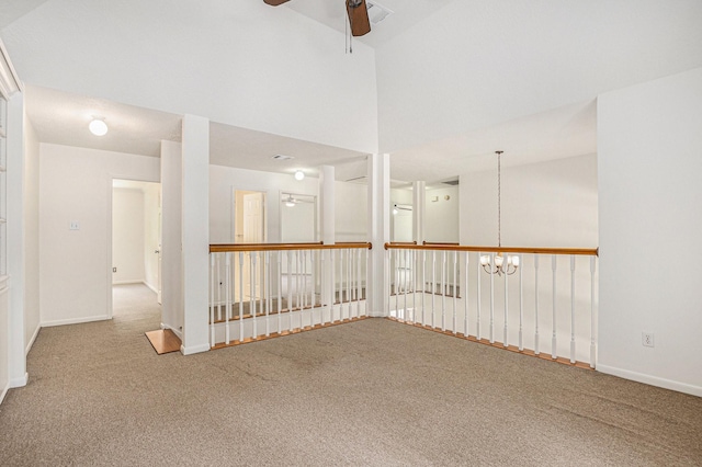 15242 Shapiro Springs Ln, Houston, TX 77095 - carpeted spare room with a chandelier, a ceiling fan, and baseboards