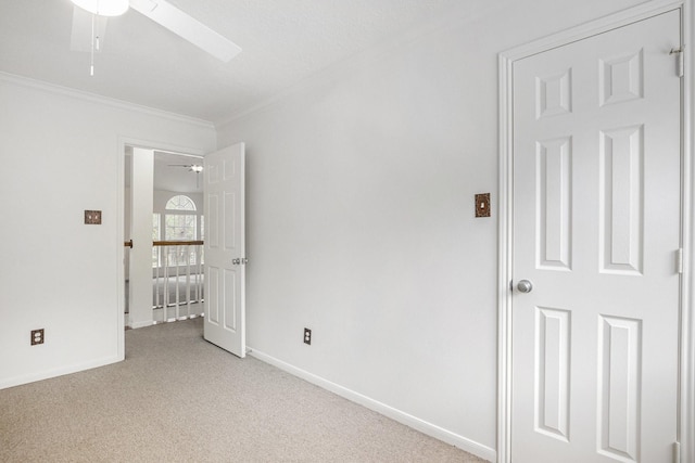 15242 Shapiro Springs Ln, Houston, TX 77095 - unfurnished bedroom featuring ornamental molding, baseboards, and light colored carpet