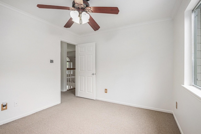 15242 Shapiro Springs Ln, Houston, TX 77095 - unfurnished bedroom featuring light colored carpet, ornamental molding, baseboards, and a ceiling fan