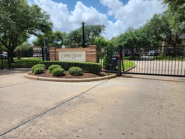 15242 Shapiro Springs Ln, Houston, TX 77095 - community / neighborhood sign featuring a gate and fence