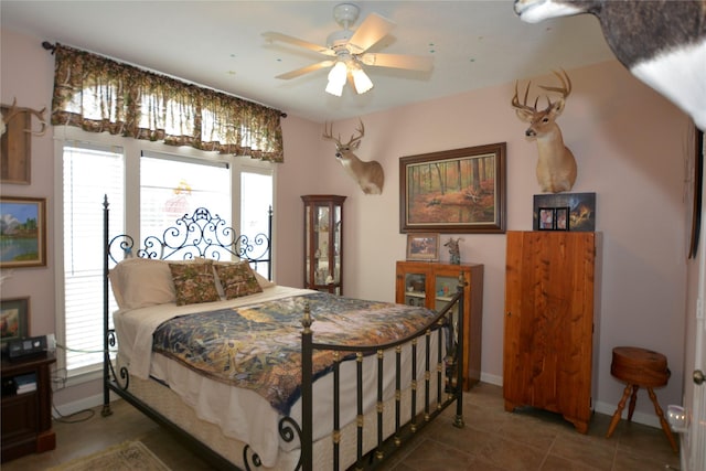 tiled bedroom with baseboards