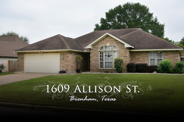 1609 Allison St, Brenham, TX 77833 - view of front facade featuring brick siding, a garage, and roof with shingles