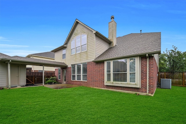 2513 Garnetfield Ln, Friendswood, TX 77546 - back of house with a chimney, brick siding, central air condition unit, and a patio