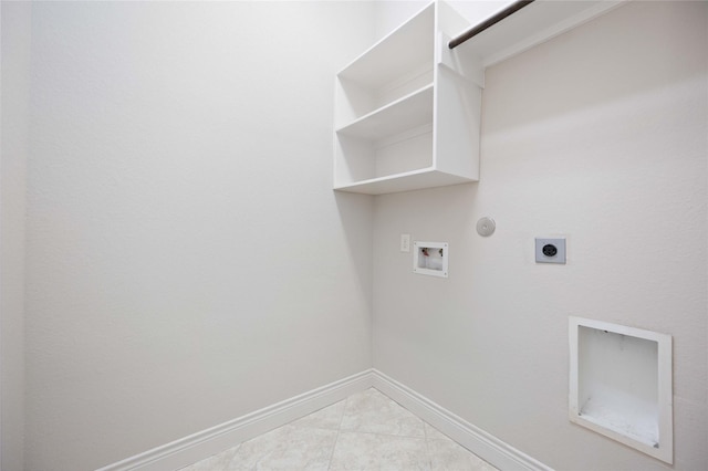 washroom with laundry area, washer hookup, hookup for a gas dryer, baseboards, and hookup for an electric dryer