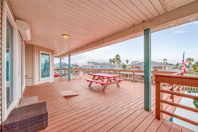 16520 Barbados Way, Jamaica Beach, TX 77554 - wooden deck with a wall unit AC