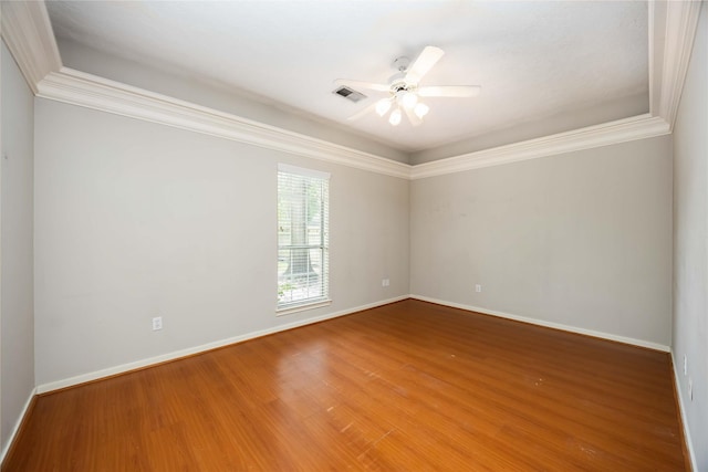 24526 Haigshire Dr, Tomball, TX 77375 - spare room featuring wood finished floors, crown molding, and a ceiling fan