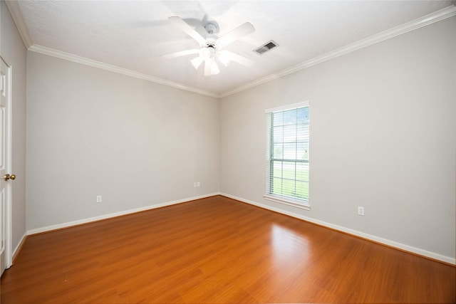 24526 Haigshire Dr, Tomball, TX 77375 - empty room featuring wood finished floors, a ceiling fan, and crown molding