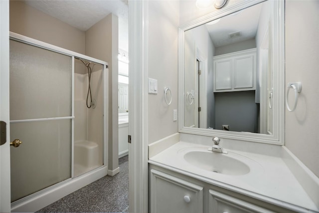 24526 Haigshire Dr, Tomball, TX 77375 - bathroom featuring a shower stall and vanity