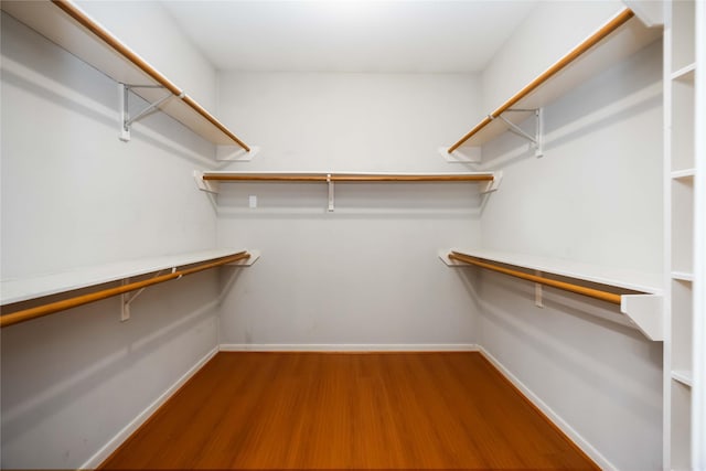 24526 Haigshire Dr, Tomball, TX 77375 - walk in closet featuring wood finished floors
