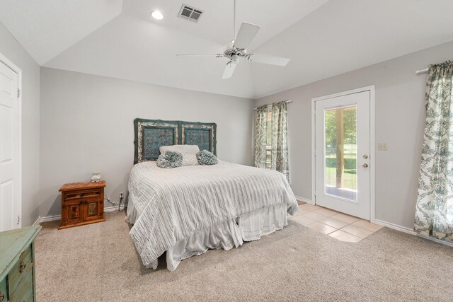 carpeted bedroom featuring lofted ceiling, access to exterior, visible vents, baseboards, and ceiling fan