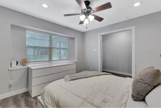 bedroom with recessed lighting, ceiling fan, baseboards, and dark wood-style flooring