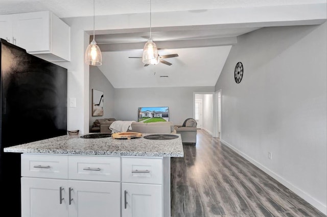 kitchen with open floor plan, vaulted ceiling with beams, freestanding refrigerator, wood finished floors, and ceiling fan