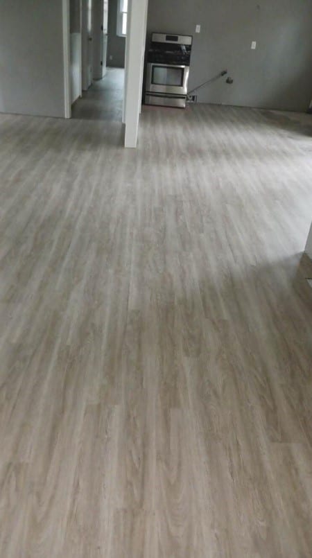 room details featuring wood finished floors and stainless steel gas stove