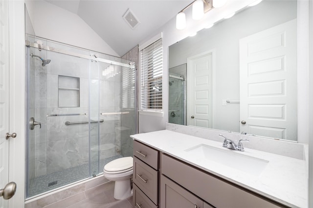 10419 Rigel Ridge Way, Richmond, TX 77406 - bathroom with vanity, a shower stall, lofted ceiling, toilet, and tile patterned flooring