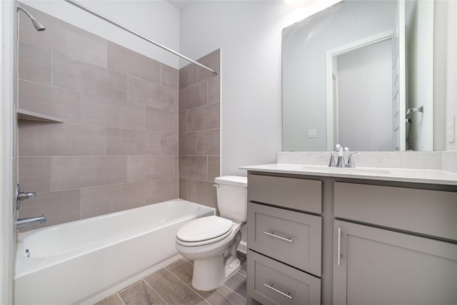 10419 Rigel Ridge Way, Richmond, TX 77406 - bathroom with vanity, toilet, and washtub / shower combination
