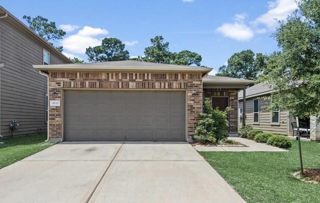 view of front of home with concrete driveway, an attached garage, brick siding, and a front yard