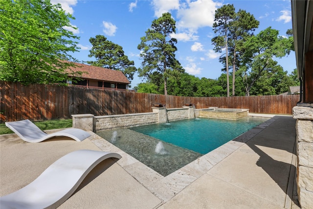 view of pool with a patio, a pool with connected hot tub, and a fenced backyard