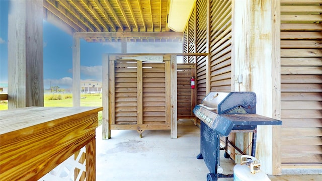 interior space with unfinished concrete floors