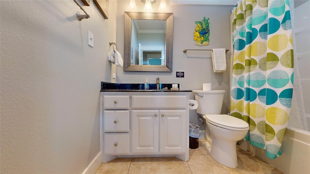 full bathroom featuring vanity, toilet, tile patterned flooring, and baseboards