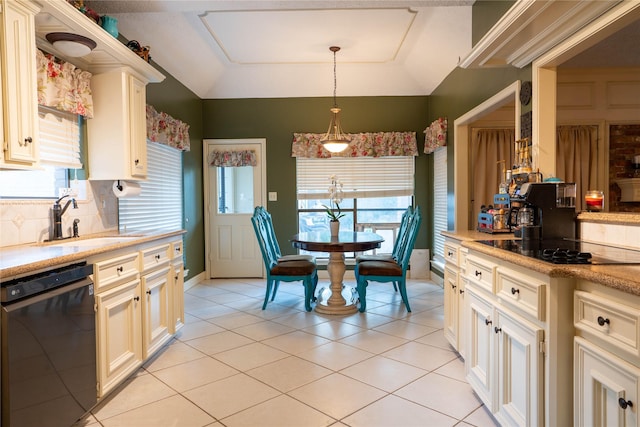 13710 Casaba Ct, Cypress, TX 77429 - kitchen featuring light countertops, plenty of natural light, a sink, and black appliances