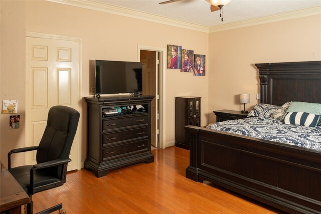 13710 Casaba Ct, Cypress, TX 77429 - bedroom with wood finished floors, crown molding, and a ceiling fan