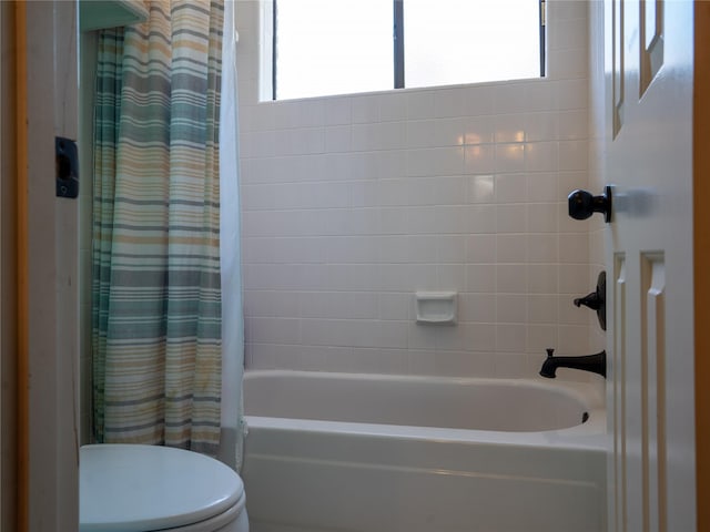 13710 Casaba Ct, Cypress, TX 77429 - bathroom featuring toilet and shower / bath combo with shower curtain