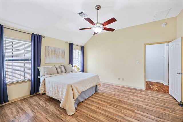 3226 Glen Forest Rd, Montgomery, TX 77356 - bedroom with wood finished floors, lofted ceiling, baseboards, and ceiling fan