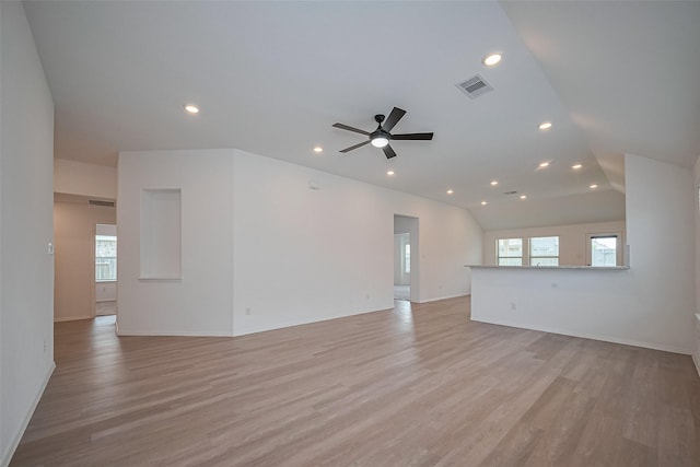 unfurnished living room with a ceiling fan, visible vents, recessed lighting, and light wood-style floors