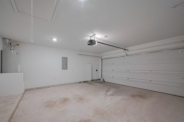 garage featuring water heater, a garage door opener, and electric panel