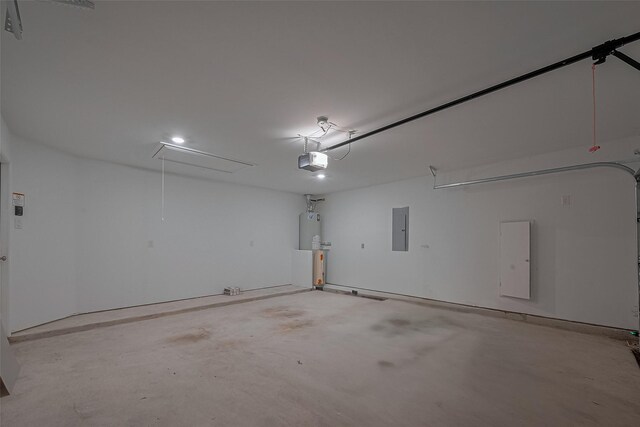 garage featuring a garage door opener and electric panel