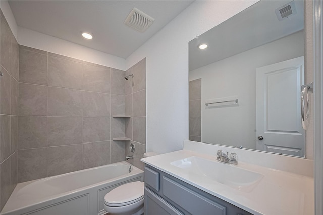 bathroom featuring shower / bath combination, visible vents, vanity, and toilet