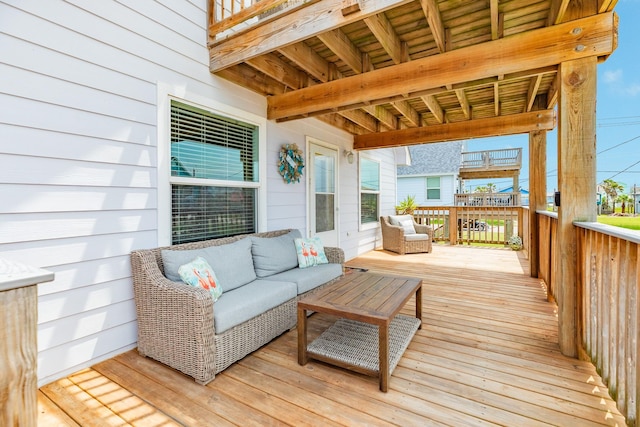 wooden deck featuring outdoor lounge area