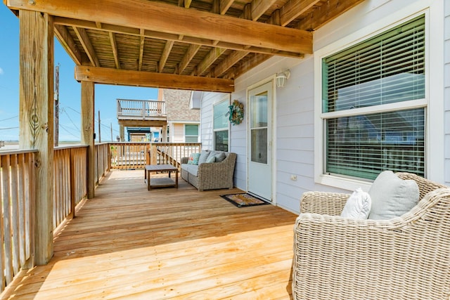 wooden deck with outdoor lounge area