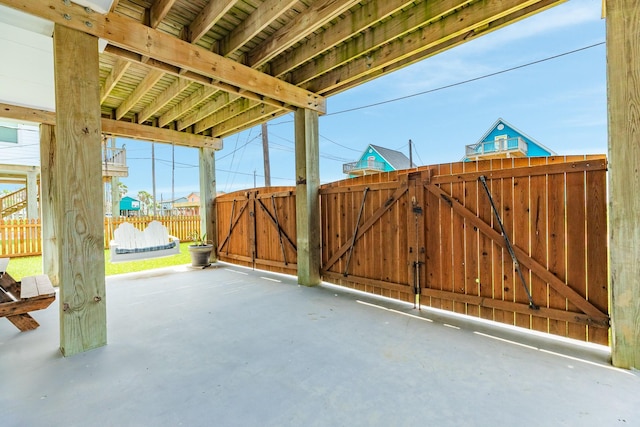 view of patio / terrace with fence and a gate