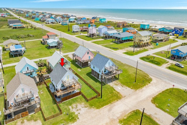 birds eye view of property with a residential view and a water view