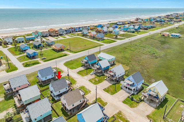 bird's eye view with a beach view, a residential view, and a water view