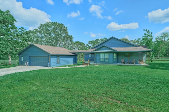 27548 N Log Cabin Rd, Montgomery, TX 77356 - ranch-style house featuring driveway and a detached garage