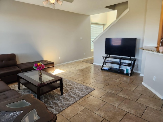15903 Winston Point Ln, Houston, TX 77084 - tiled living area with baseboards and ceiling fan