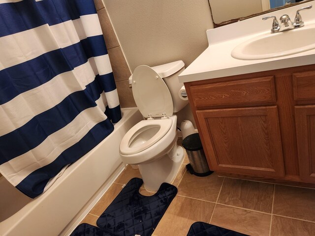 15903 Winston Point Ln, Houston, TX 77084 - full bathroom featuring vanity, shower / bath combo with shower curtain, and toilet