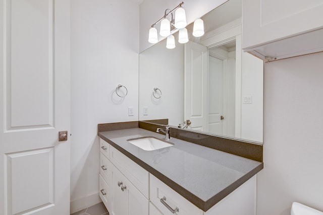 2718 Oakwood Crest Ln, Houston, TX 77018 - bathroom with baseboards, vanity, and toilet