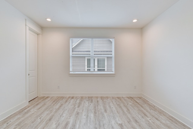 2718 Oakwood Crest Ln, Houston, TX 77018 - unfurnished room with baseboards, wood finished floors, and recessed lighting