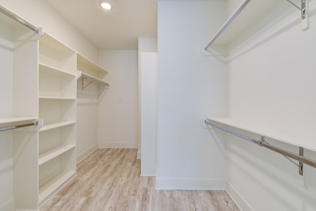 2718 Oakwood Crest Ln, Houston, TX 77018 - walk in closet with wood finished floors