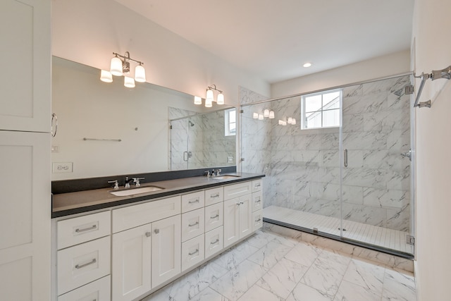 2718 Oakwood Crest Ln, Houston, TX 77018 - bathroom with double vanity, a marble finish shower, marble finish floor, and a sink